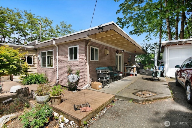 7431 S 132nd St, Seattle, WA 98178 - view of property exterior featuring a wooden deck