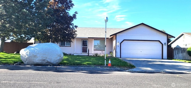 390 4th Ave SE, Ephrata, WA 98823 - single story home with an attached garage and concrete driveway