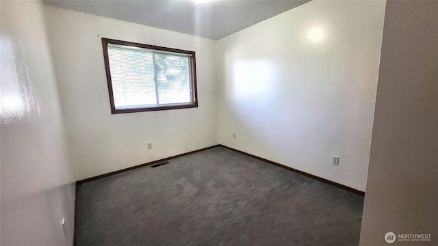 390 4th Ave SE, Ephrata, WA 98823 - spare room featuring carpet flooring and baseboards