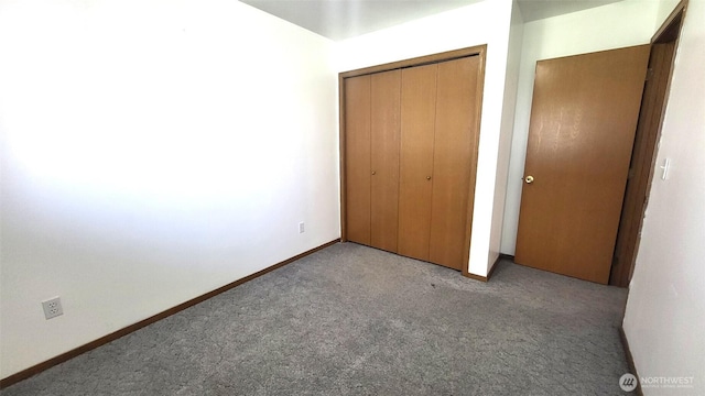 390 4th Ave SE, Ephrata, WA 98823 - unfurnished bedroom with carpet floors, a closet, and baseboards