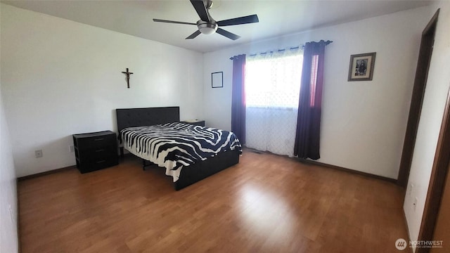 390 4th Ave SE, Ephrata, WA 98823 - bedroom with wood finished floors, baseboards, and ceiling fan