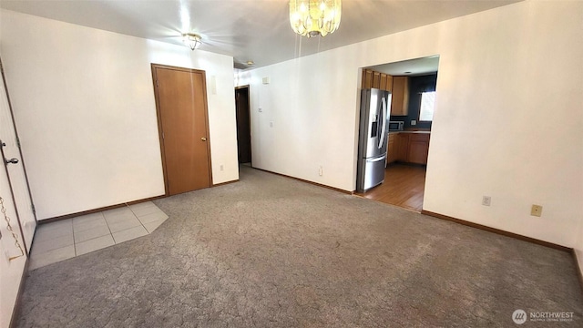 390 4th Ave SE, Ephrata, WA 98823 - unfurnished room featuring carpet floors and baseboards
