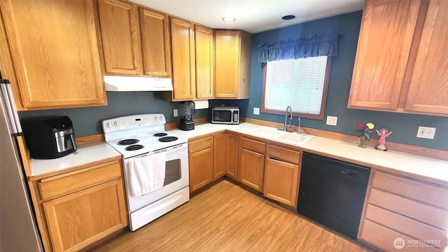 390 4th Ave SE, Ephrata, WA 98823 - kitchen featuring white electric range oven, dishwasher, under cabinet range hood, a sink, and stainless steel microwave