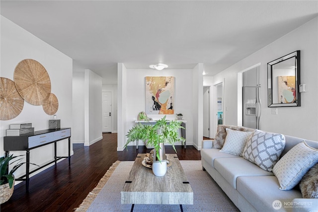 613 4th Ave W Unit 202, Seattle, WA 98119 - living room featuring wood finished floors and baseboards