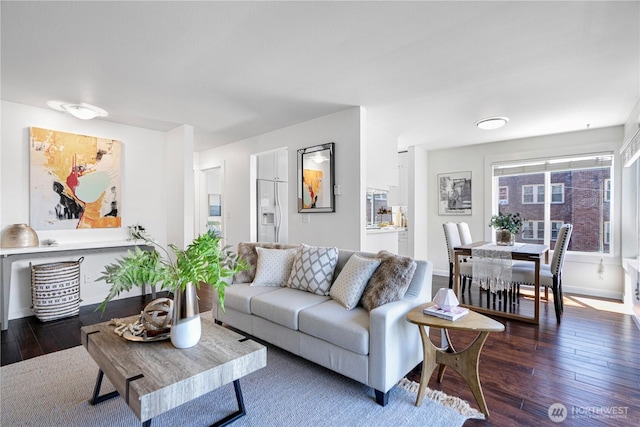 613 4th Ave W Unit 202, Seattle, WA 98119 - living room featuring wood-type flooring and baseboards