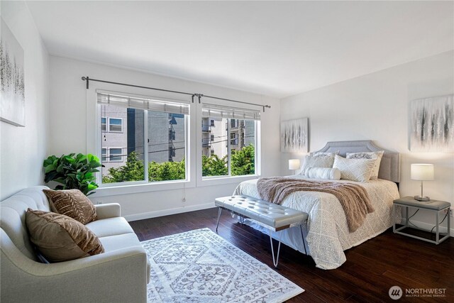 613 4th Ave W Unit 202, Seattle, WA 98119 - bedroom featuring hardwood / wood-style floors and baseboards