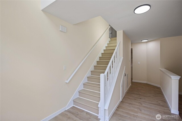 2021 224th Pl NE, Sammamish, WA 98074 - staircase featuring baseboards and wood finished floors