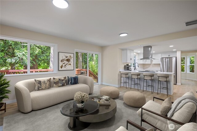 2021 224th Pl NE, Sammamish, WA 98074 - living room featuring baseboards and recessed lighting
