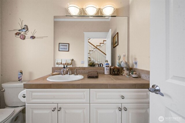 234 26th St NW, Long Beach, WA 98631 - bathroom featuring toilet and vanity