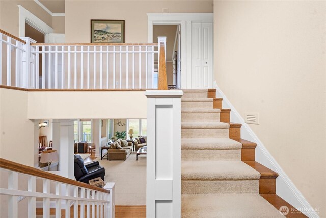 234 26th St NW, Long Beach, WA 98631 - staircase with baseboards and a high ceiling