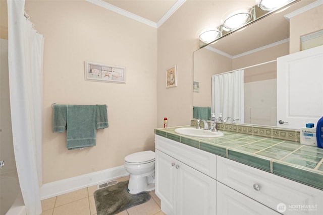 234 26th St NW, Long Beach, WA 98631 - bathroom featuring toilet, baseboards, vanity, crown molding, and tile patterned flooring