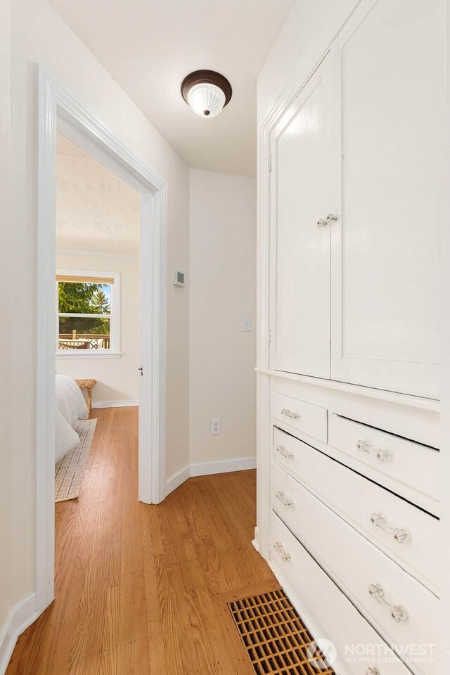 1214 NE 98th St, Seattle, WA 98115 - corridor featuring light wood-style floors and baseboards