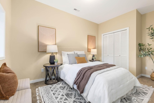 1214 NE 98th St, Seattle, WA 98115 - carpeted bedroom featuring a closet and baseboards