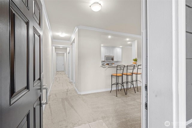 1310 Old Fairhaven Pkwy Unit 102, Bellingham, WA 98225 - corridor with light carpet, ornamental molding, and baseboards