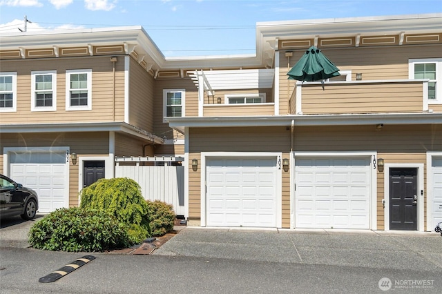 1310 Old Fairhaven Pkwy Unit 102, Bellingham, WA 98225 - townhome / multi-family property featuring an attached garage and driveway