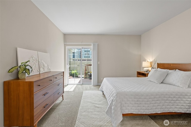 1310 Old Fairhaven Pkwy Unit 102, Bellingham, WA 98225 - bedroom featuring light carpet and access to exterior