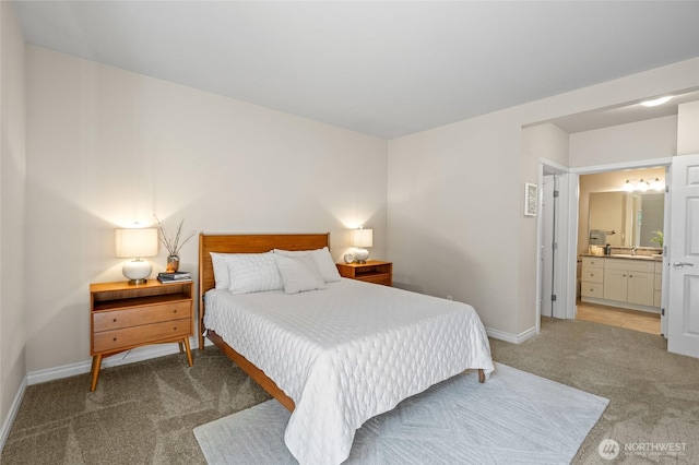 1310 Old Fairhaven Pkwy Unit 102, Bellingham, WA 98225 - bedroom featuring light colored carpet, baseboards, a sink, and connected bathroom