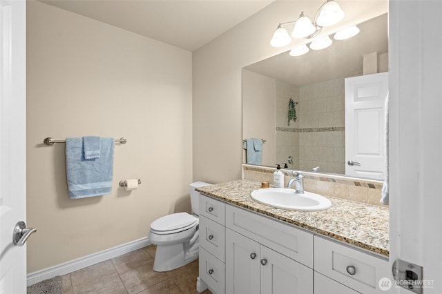 1310 Old Fairhaven Pkwy Unit 102, Bellingham, WA 98225 - bathroom featuring vanity, baseboards, toilet, tiled shower, and tile patterned flooring