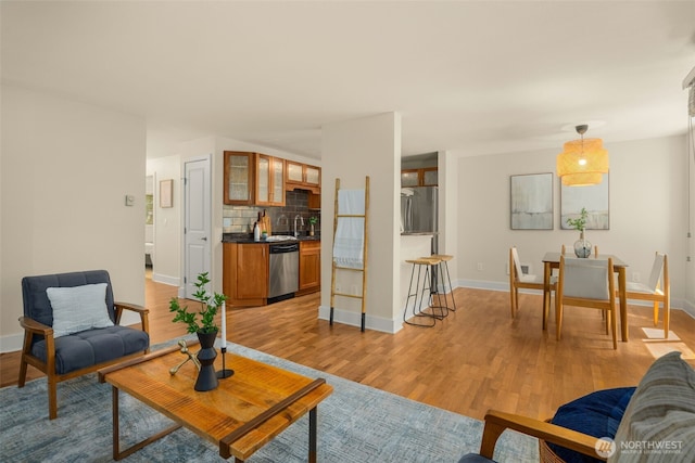 11058 NE 33rd Pl Unit B9, Bellevue, WA 98004 - living area featuring light wood finished floors and baseboards