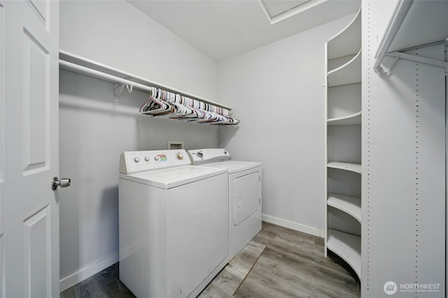 1128 W Elm St, Walla Walla, WA 99362 - washroom featuring washer and dryer, light wood finished floors, and baseboards