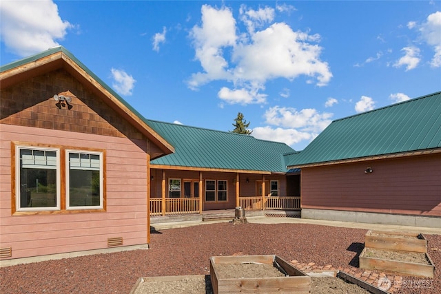 706 S A St, Roslyn, WA 98941 - back of property featuring a porch and metal roof