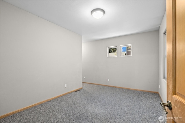 706 S A St, Roslyn, WA 98941 - carpeted empty room featuring baseboards