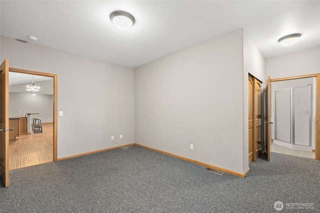 706 S A St, Roslyn, WA 98941 - unfurnished room featuring carpet, baseboards, and a smoke detector