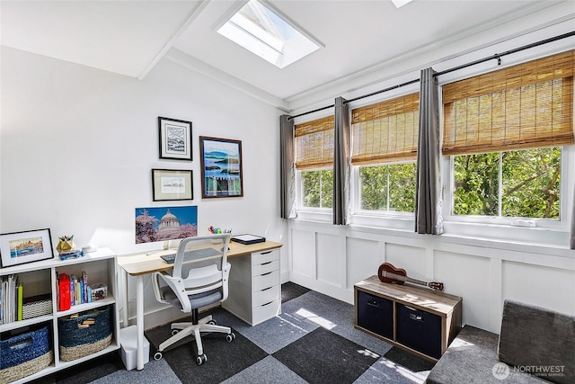490 Madison Ave N Unit 202, Bainbridge Island, WA 98110 - office with a skylight, lofted ceiling, a decorative wall, granite tiled floors, and crown molding