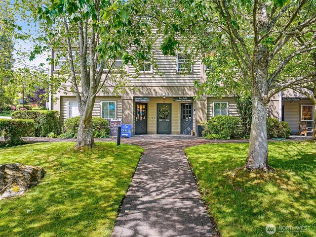 490 Madison Ave N Unit 202, Bainbridge Island, WA 98110 - view of front of house with a front yard