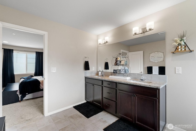 2225 Seringa Ave, Bremerton, WA 98310 - full bathroom with double vanity, ensuite bath, baseboards, and tile patterned floors