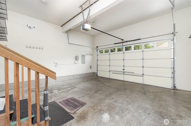 1700 235th Pl SW, Bothell, WA 98021 - garage featuring a garage door opener and electric panel