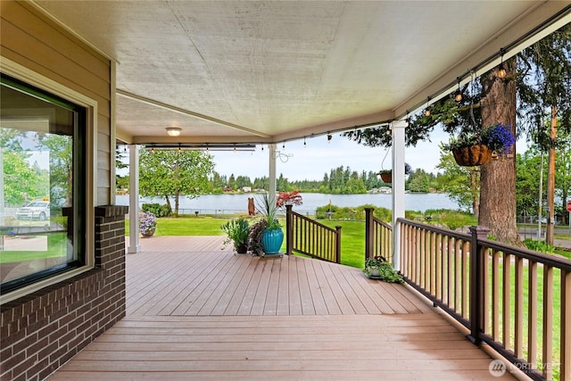 16801 Lakeside Dr S, Spanaway, WA 98387 - wooden terrace featuring a water view and a yard