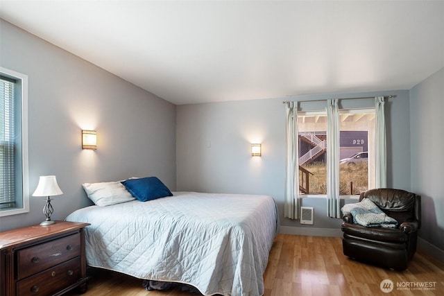 927 Pheasant Run, Westport, WA 98595 - bedroom with light wood-style flooring and baseboards