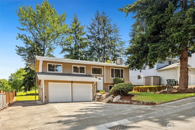 29630 24th Ave S, Federal Way, WA 98003 - raised ranch featuring driveway, a garage, and a chimney