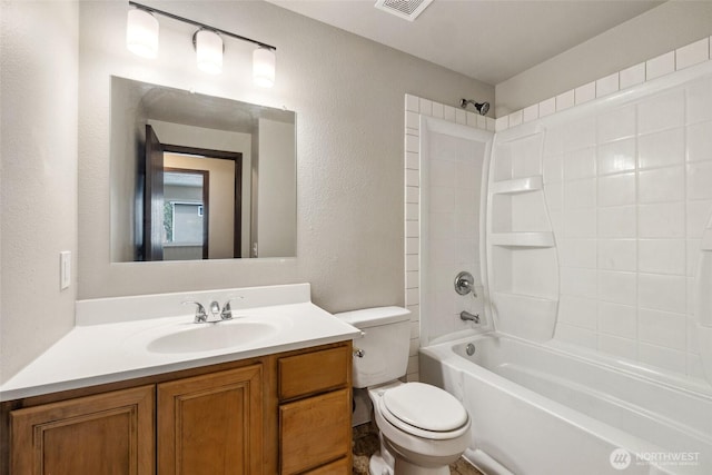 29630 24th Ave S, Federal Way, WA 98003 - bathroom featuring vanity, toilet, shower / bathtub combination, and a textured wall