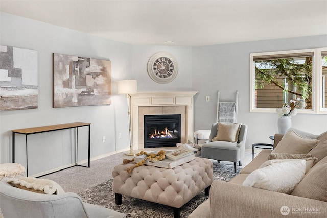 14819 1st Ave NE, Duvall, WA 98019 - carpeted living room with a tiled fireplace and baseboards