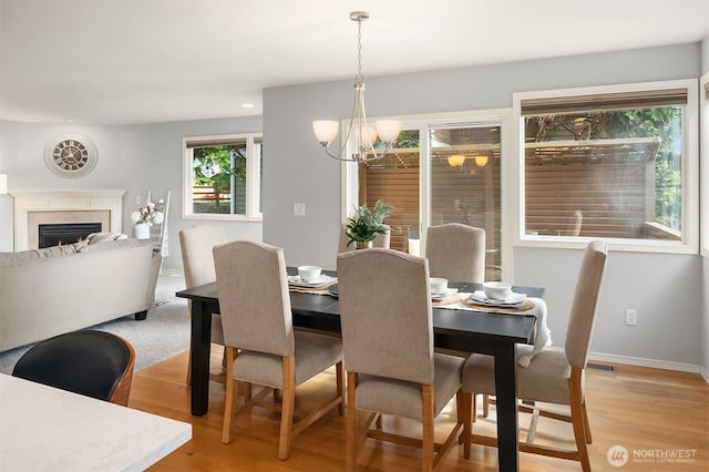 14819 1st Ave NE, Duvall, WA 98019 - dining space with plenty of natural light, a chandelier, light wood-type flooring, and recessed lighting