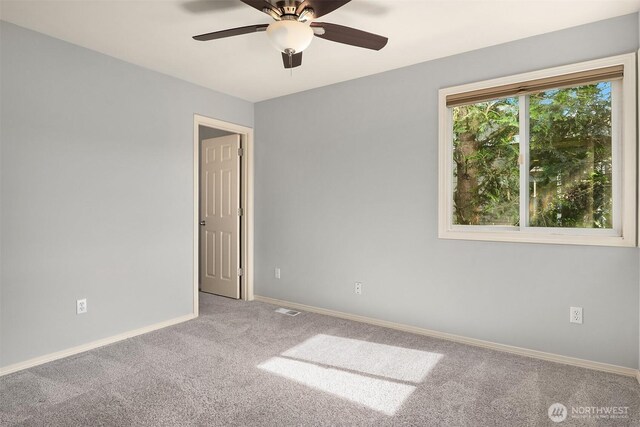 14819 1st Ave NE, Duvall, WA 98019 - carpeted spare room featuring ceiling fan and baseboards