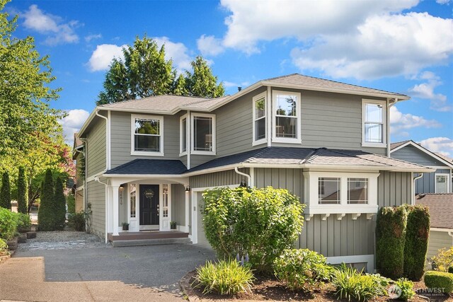 14819 1st Ave NE, Duvall, WA 98019 - traditional home featuring roof with shingles and driveway
