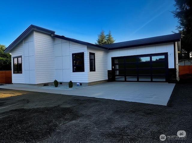 370 S Butterclam St SW, Ocean Shores, WA 98569 - view of front of property featuring concrete driveway, an attached garage, and crawl space