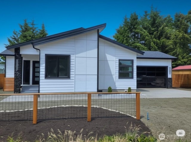 370 S Butterclam St SW, Ocean Shores, WA 98569 - view of front of home with a garage and driveway