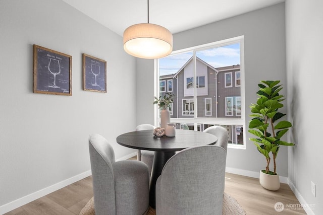15726 40th Ave W Unit B3, Lynnwood, WA 98087 - dining area featuring light wood finished floors and baseboards