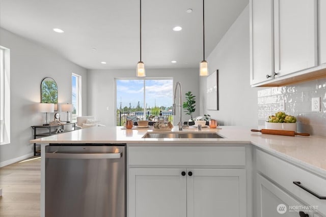 15726 40th Ave W Unit B3, Lynnwood, WA 98087 - kitchen with dishwasher, a sink, white cabinetry, plenty of natural light, and recessed lighting