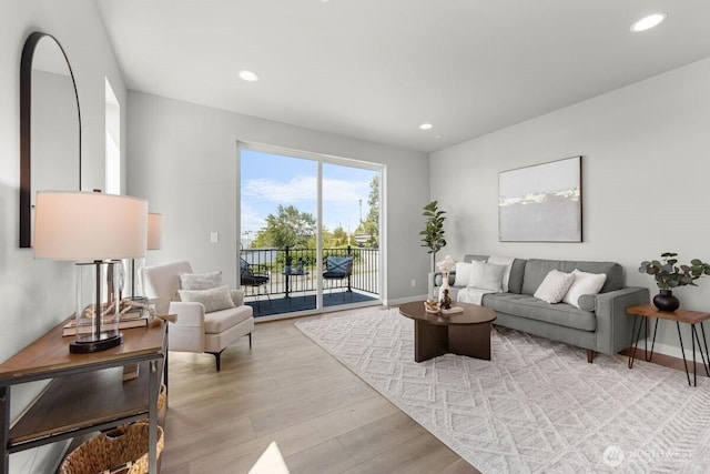 15726 40th Ave W Unit B3, Lynnwood, WA 98087 - living area featuring light wood-style flooring, recessed lighting, and baseboards