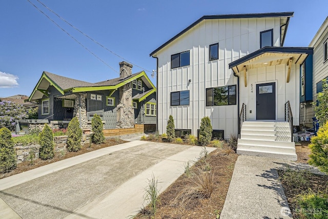 524 27th Ave, Seattle, WA 98122 - view of front of house featuring board and batten siding and entry steps