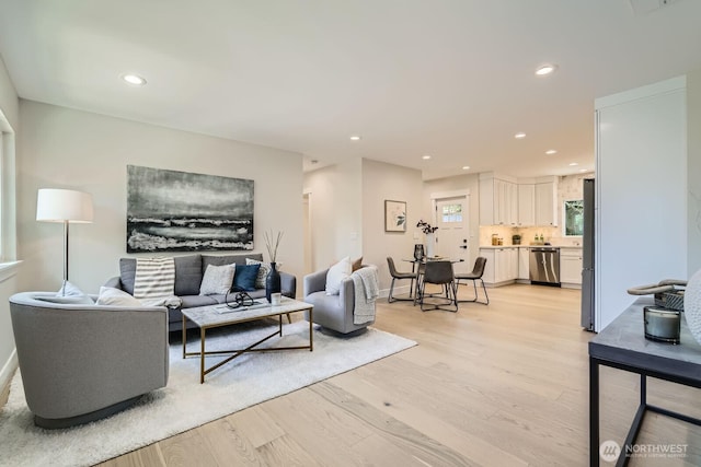 524 27th Ave, Seattle, WA 98122 - living area featuring light wood-style flooring, recessed lighting, and baseboards