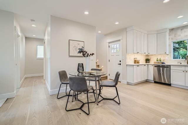 524 27th Ave, Seattle, WA 98122 - dining area with light wood-style floors, baseboards, plenty of natural light, and recessed lighting