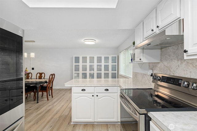 5371 Pineridge Dr NE, Bremerton, WA 98311 - kitchen featuring stainless steel appliances, under cabinet range hood, a peninsula, and white cabinetry