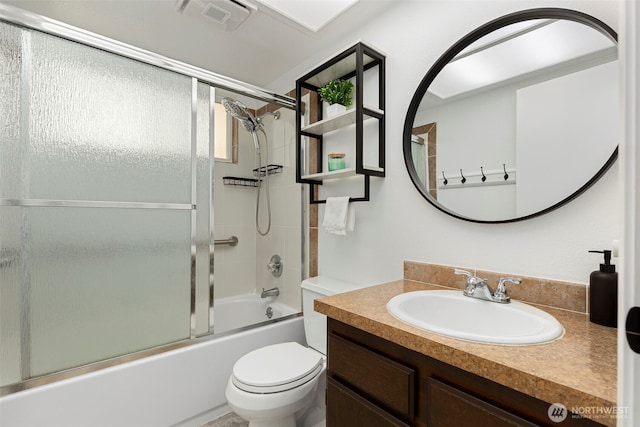 5371 Pineridge Dr NE, Bremerton, WA 98311 - full bathroom with vanity, toilet, and bath / shower combo with glass door