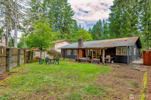 5371 Pineridge Dr NE, Bremerton, WA 98311 - rear view of property with a chimney, outdoor lounge area, and a patio